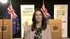 New Zealand's Prime Minister Jacinda Ardern smiles and waves at the camera