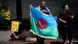 Protester holds flag for Roma people